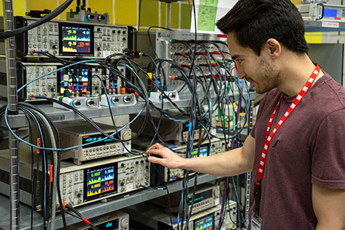 MIT physicist Kevin Nuckolls monitoring an experiment at the Maglab.