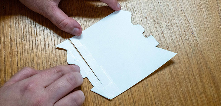 Tape a paper together