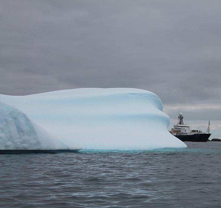 The Research Vessel Roger Revelle, off Palmer Station in Antarctica.