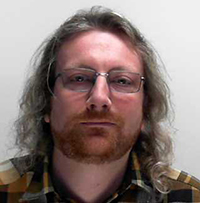 Andrew J Woods